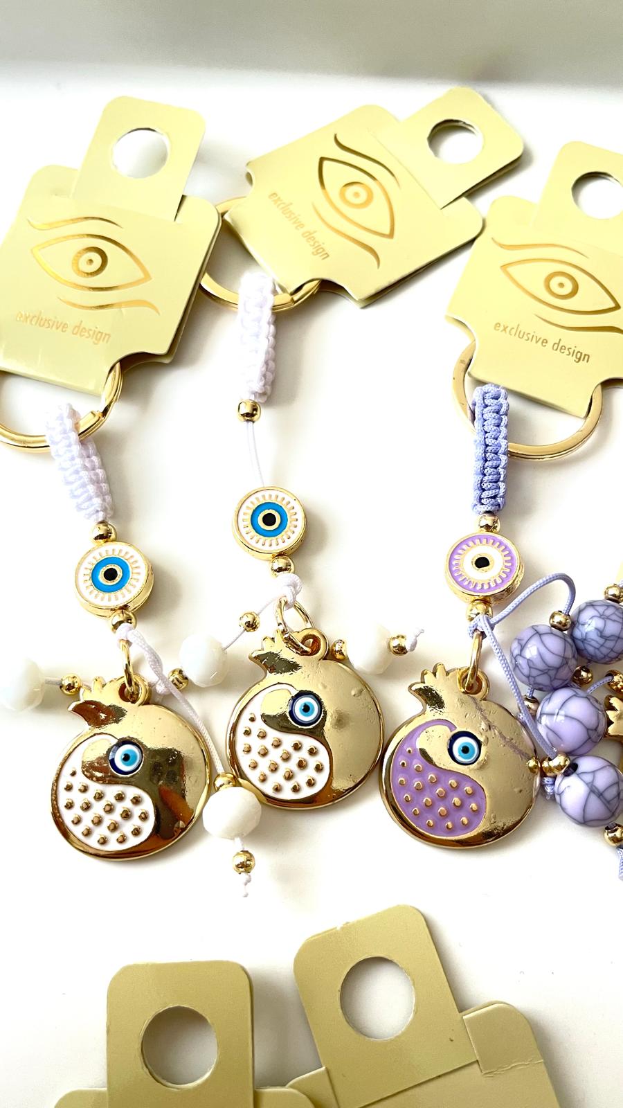 White Pomegranate Abundance Design Gold Evil Eye Keychain