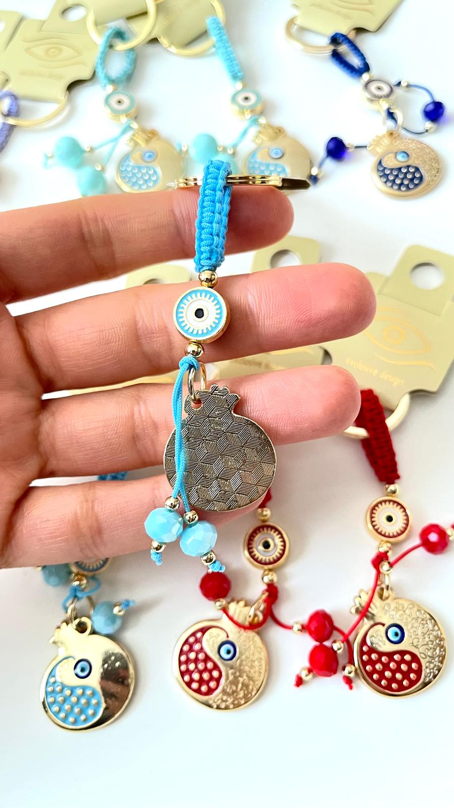 Light Blue Pomegranate Abundance Design Gold Evil Eye Keychain