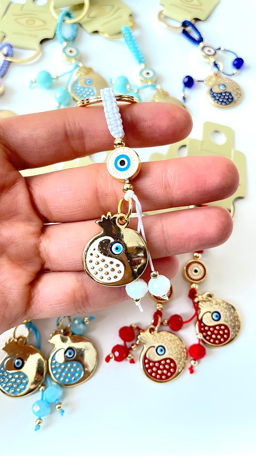 White Pomegranate Abundance Design Gold Evil Eye Keychain