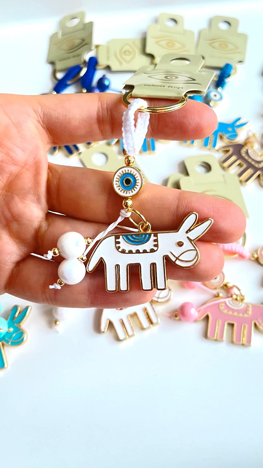 White Donkey Design Gold Evil Eye Keychain