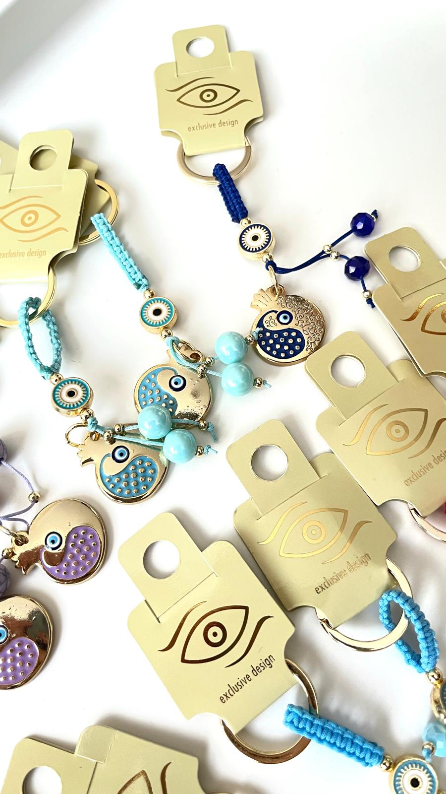 White Pomegranate Abundance Design Gold Evil Eye Keychain
