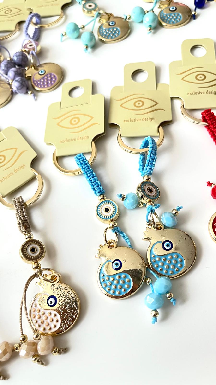 Light Blue Pomegranate Abundance Design Gold Evil Eye Keychain