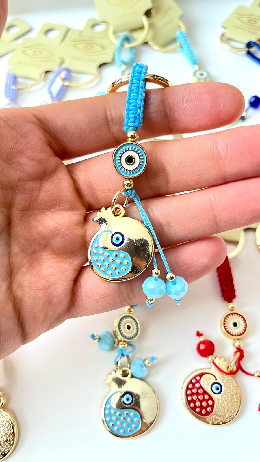 Light Blue Pomegranate Abundance Design Gold Evil Eye Keychain