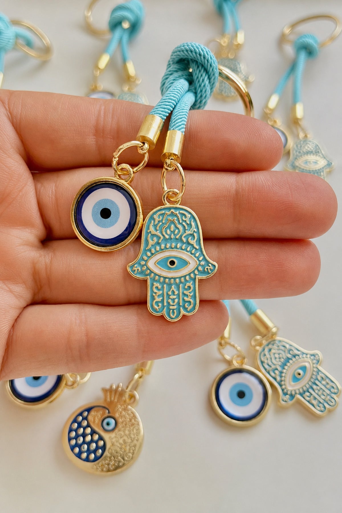 Rose Evil Eye Cord Keychain - Light Blue Hamsa Design