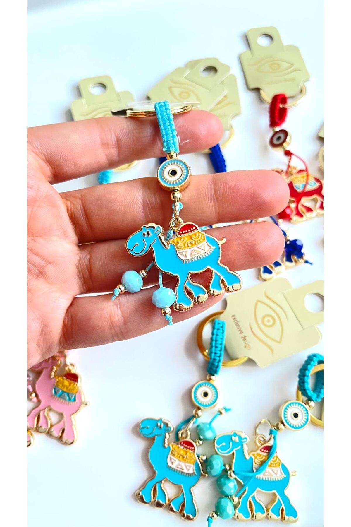 Bella Gold-Plated Animal Charm Keychain - Blue Camel Design